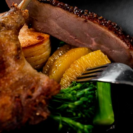 The Point Brisbane Hotel Ngoại thất bức ảnh A duck confit with orange and vegetables