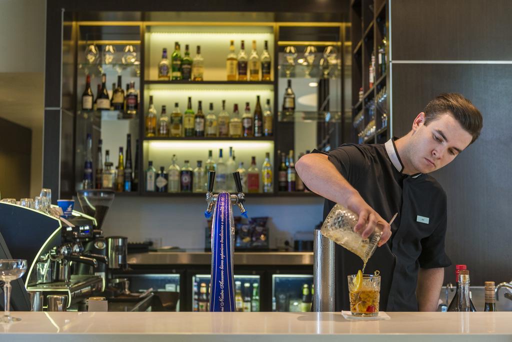 The Point Brisbane Hotel Ngoại thất bức ảnh A bartender at work